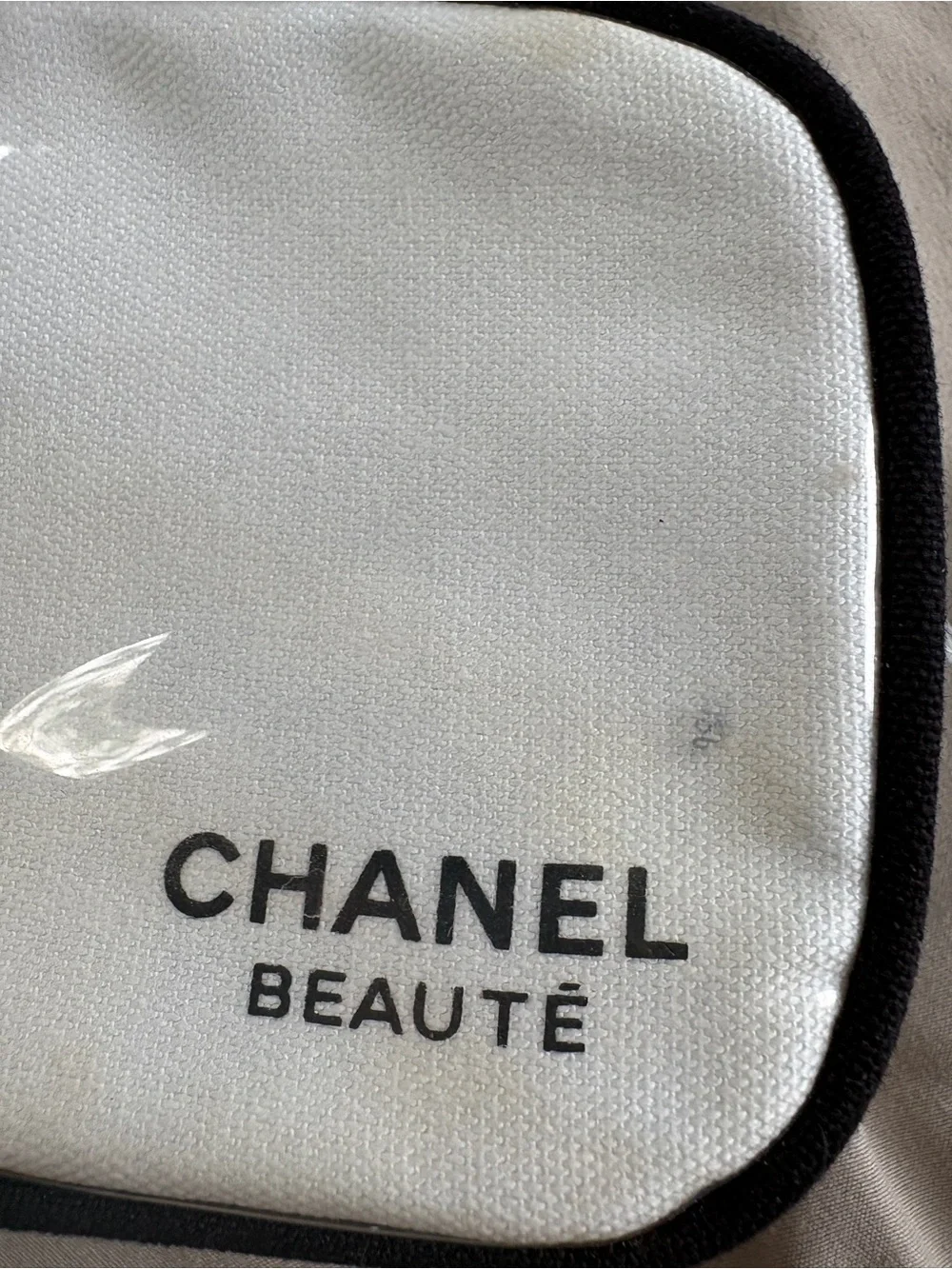 CHANEL Beauté White Cosmetic Pouch with Black Trim